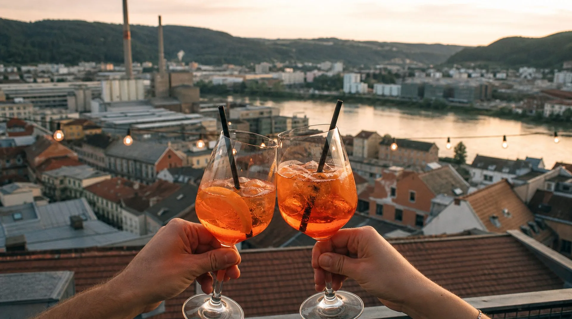 Rooftop-Bars in Linz: Cocktails über den Dächern der Stadt